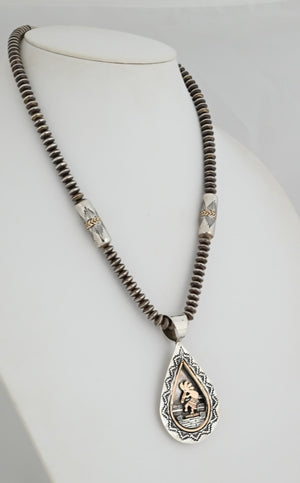 Sterling Silver Bead Necklace with Barrels that have 14K gold, possibly Ray Tafoya, 23" long