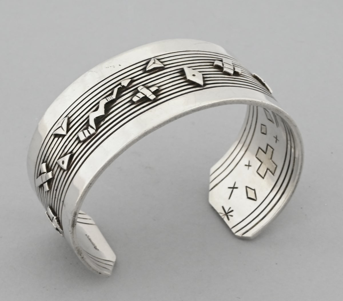 Bracelet: Sterling Silver Cuff with Petroglyph designs (vintage)
