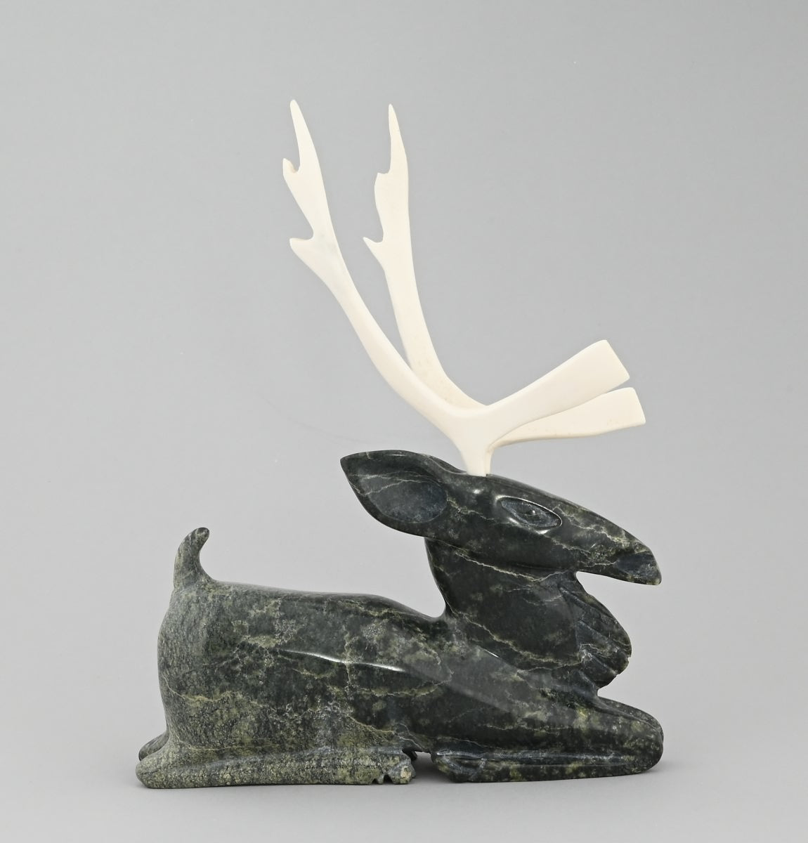 Kneeling Caribou by Sangani Osuitok (Inuit)