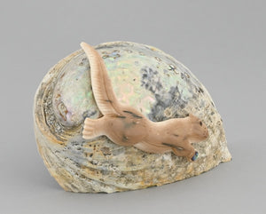 Otter on Shell by Nakwesee
