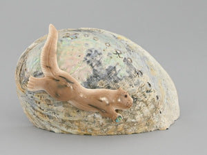 Otter on Shell by Nakwesee
