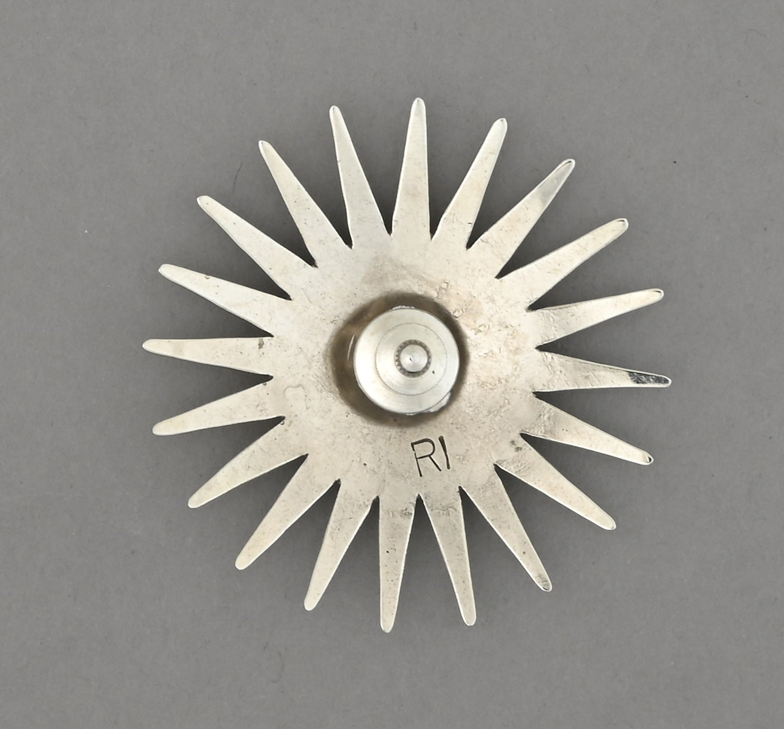 Pin with Sun Symbol by Marlene Riding In Mameah