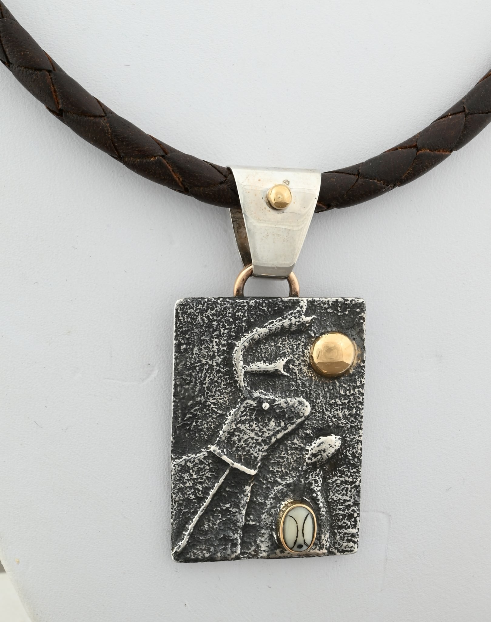 Seal and Caribou Pendant by Denise Wallace