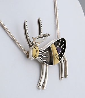 Caribou Pin/Pendant with Sugilite by Denise Wallace
