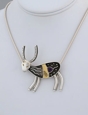 Caribou Pin/Pendant with Sugilite by Denise Wallace