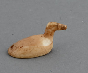 Tiny Waterfowl Artifact with drilled tail