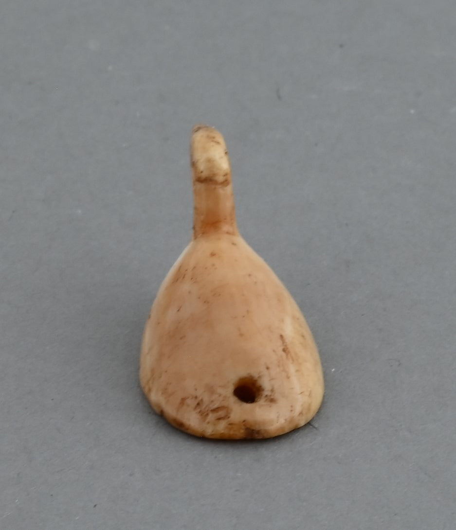 Tiny Waterfowl Artifact with drilled tail