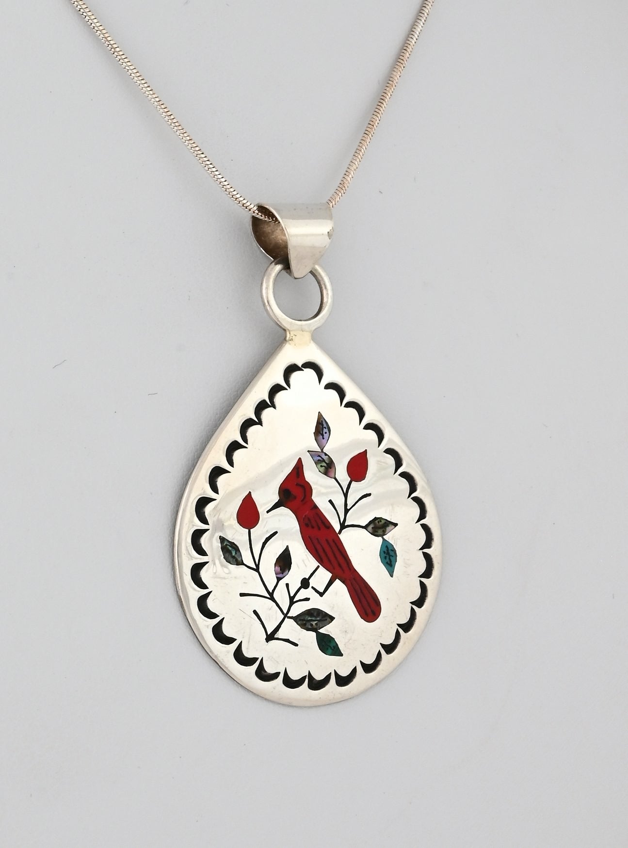 Pendant with Inlaid Cardinal by Raymond Boyd