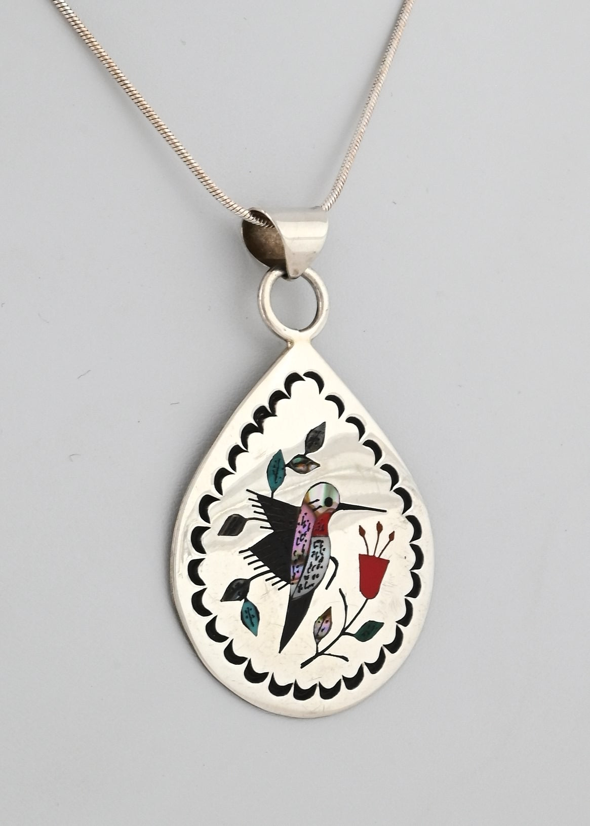 Pendant with Inlaid Hummingbird by Raymond Boyd