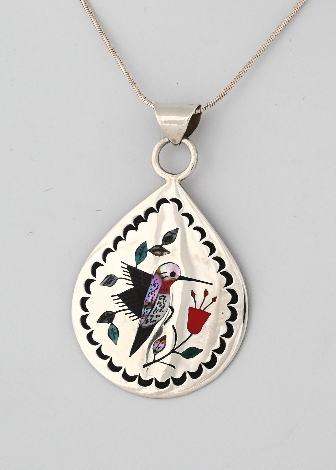 Pendant with Inlaid Hummingbird by Raymond Boyd