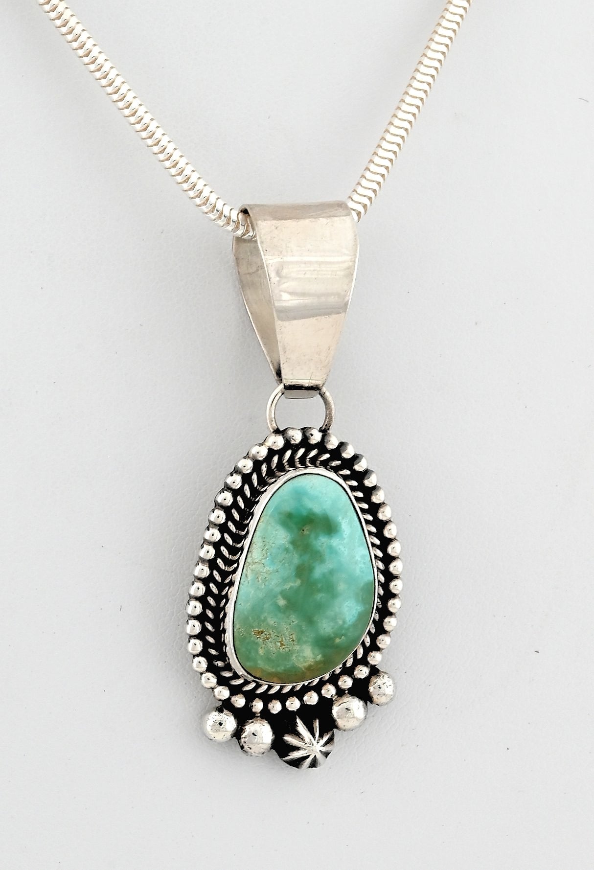 Pendant with Sonoran Turquoise by Larry Yazzie