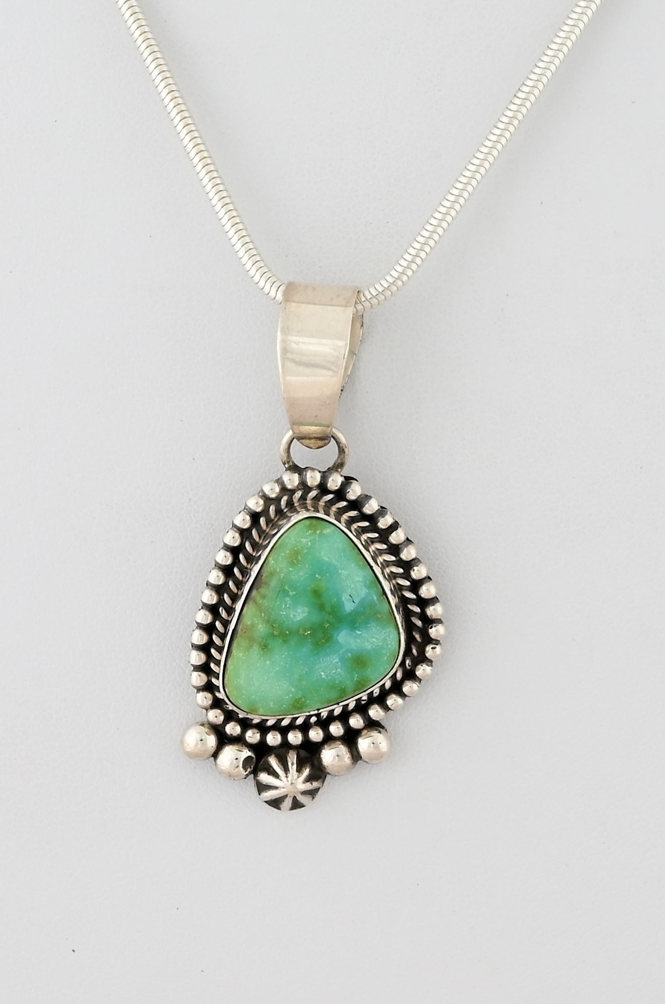 Pendant with Sonoran Turquoise by Larry Yazzie