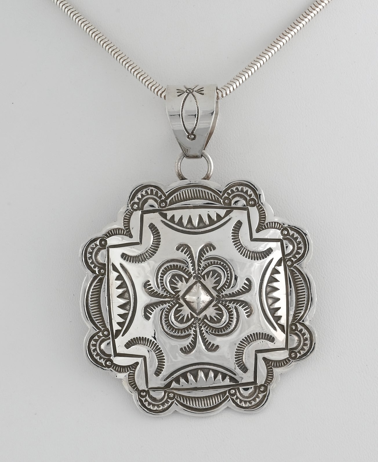 Pendant by Arnold Blackgoat