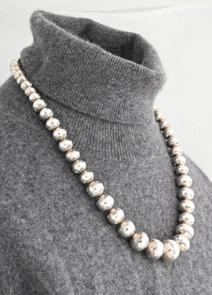 Necklace, 24" Graduated Navajo Pearls by Jeffrey Nelson