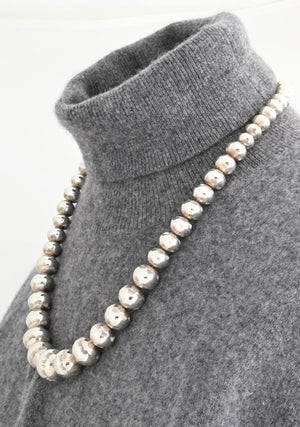 Necklace, 24" Graduated Navajo Pearls by Jeffrey Nelson