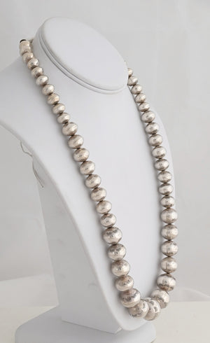 Necklace, 24" Graduated Navajo Pearls by Jeffrey Nelson