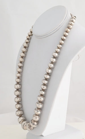 Necklace, 24" Graduated Navajo Pearls by Jeffrey Nelson