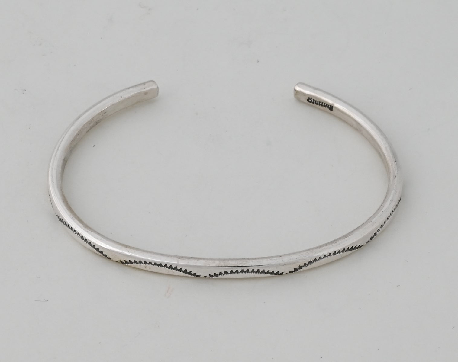 Bracelet, Oval Wire Cuff with stamping by Ben Tahe