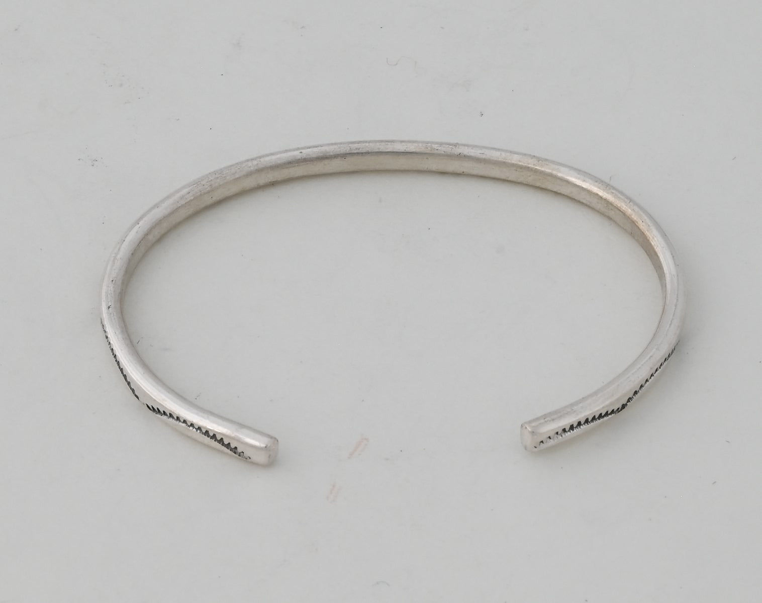 Bracelet, Oval Wire Cuff with stamping by Ben Tahe