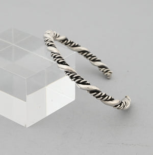 Bracelet with twists by Ben Tahe (Navajo)