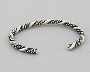 Bracelet with twists by Ben Tahe (Navajo)