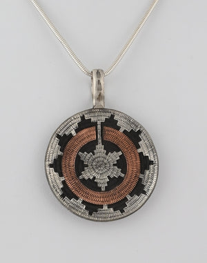 Basket Pendant by Roland Begay (Navajo)