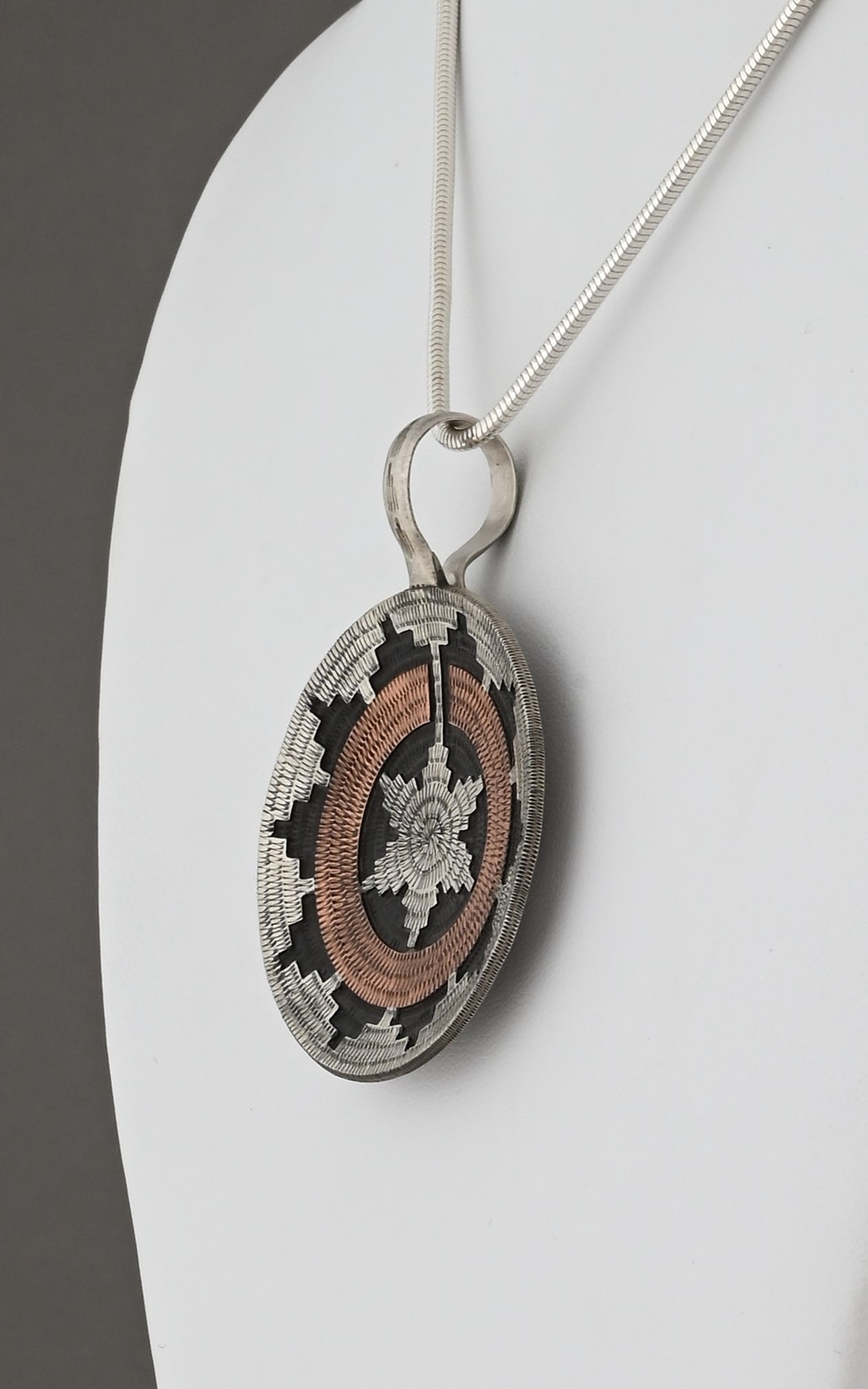 Basket Pendant by Roland Begay (Navajo)