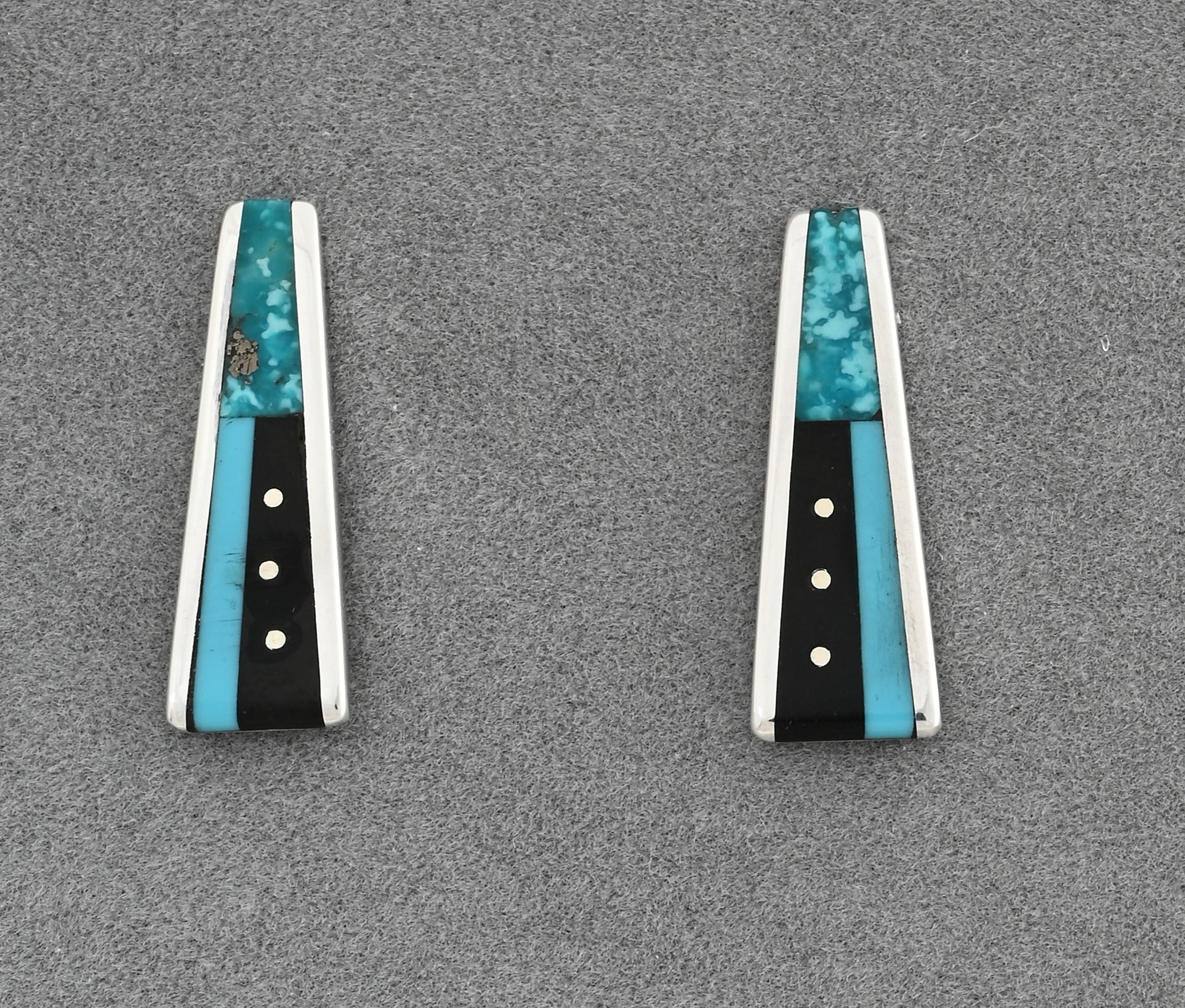 Earrings by Jimmy Poyer