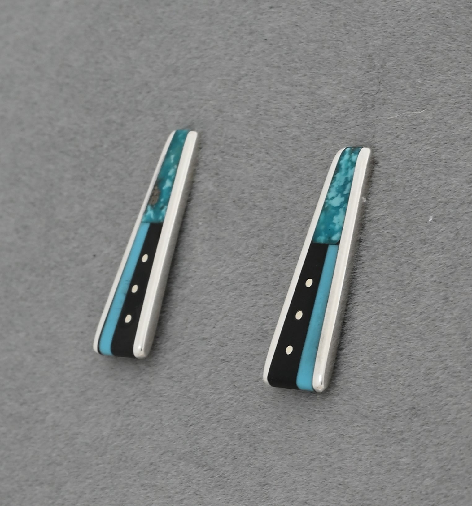 Earrings by Jimmy Poyer