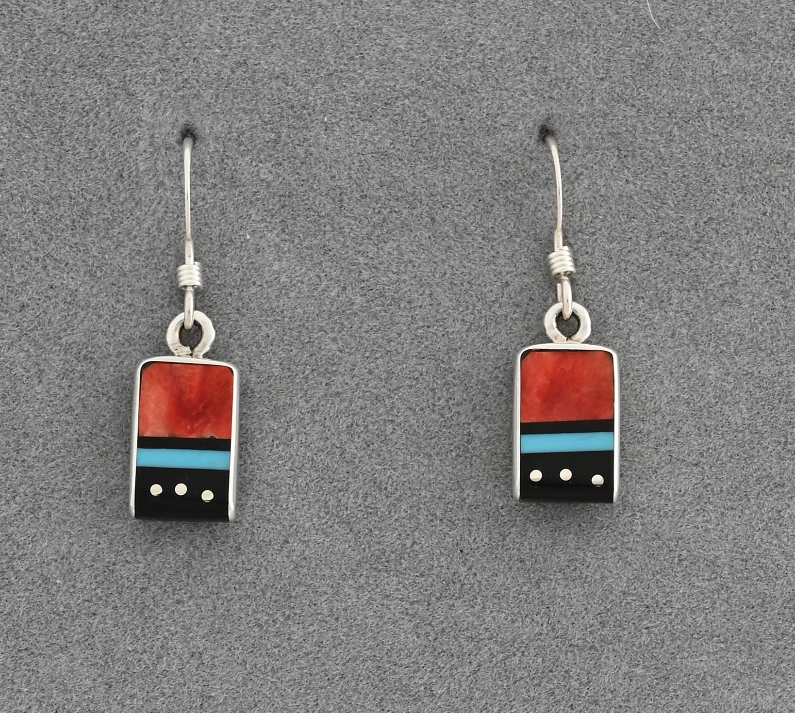 Earrings by Jimmy Poyer