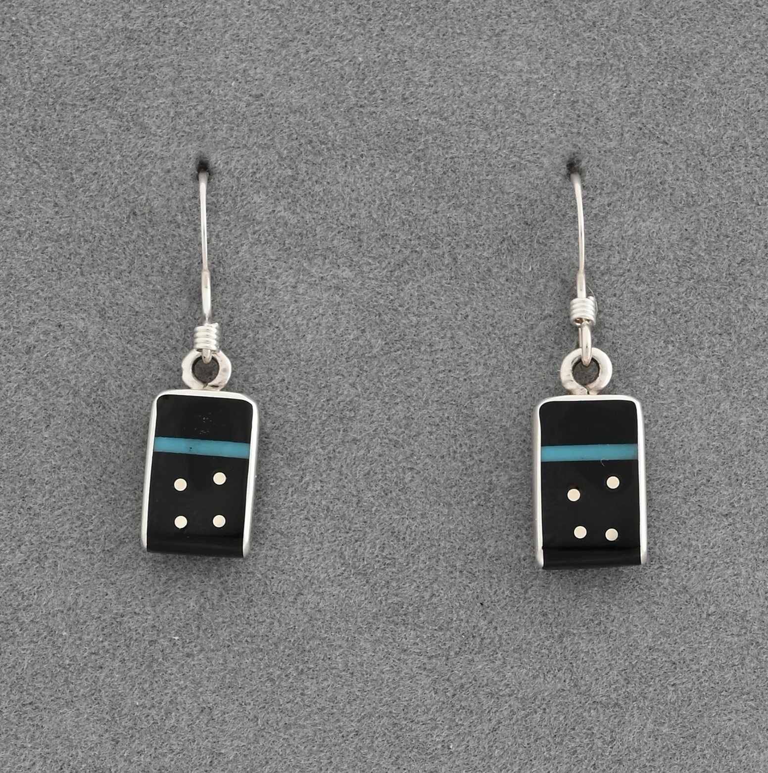 Earrings by Jimmy Poyer