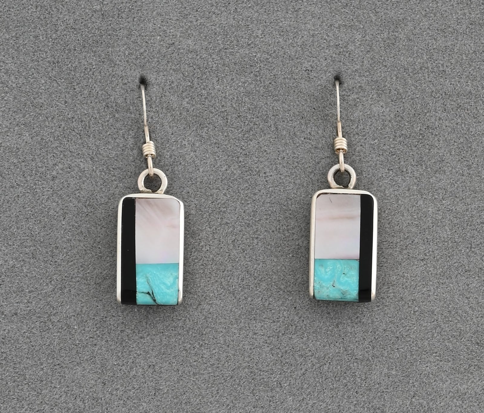 Earrings by Jimmy Poyer