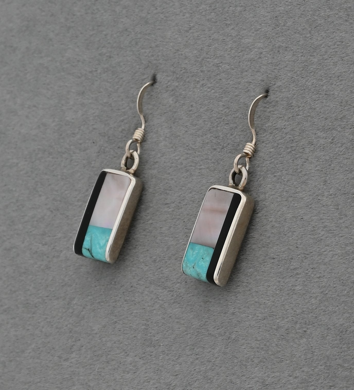 Earrings by Jimmy Poyer