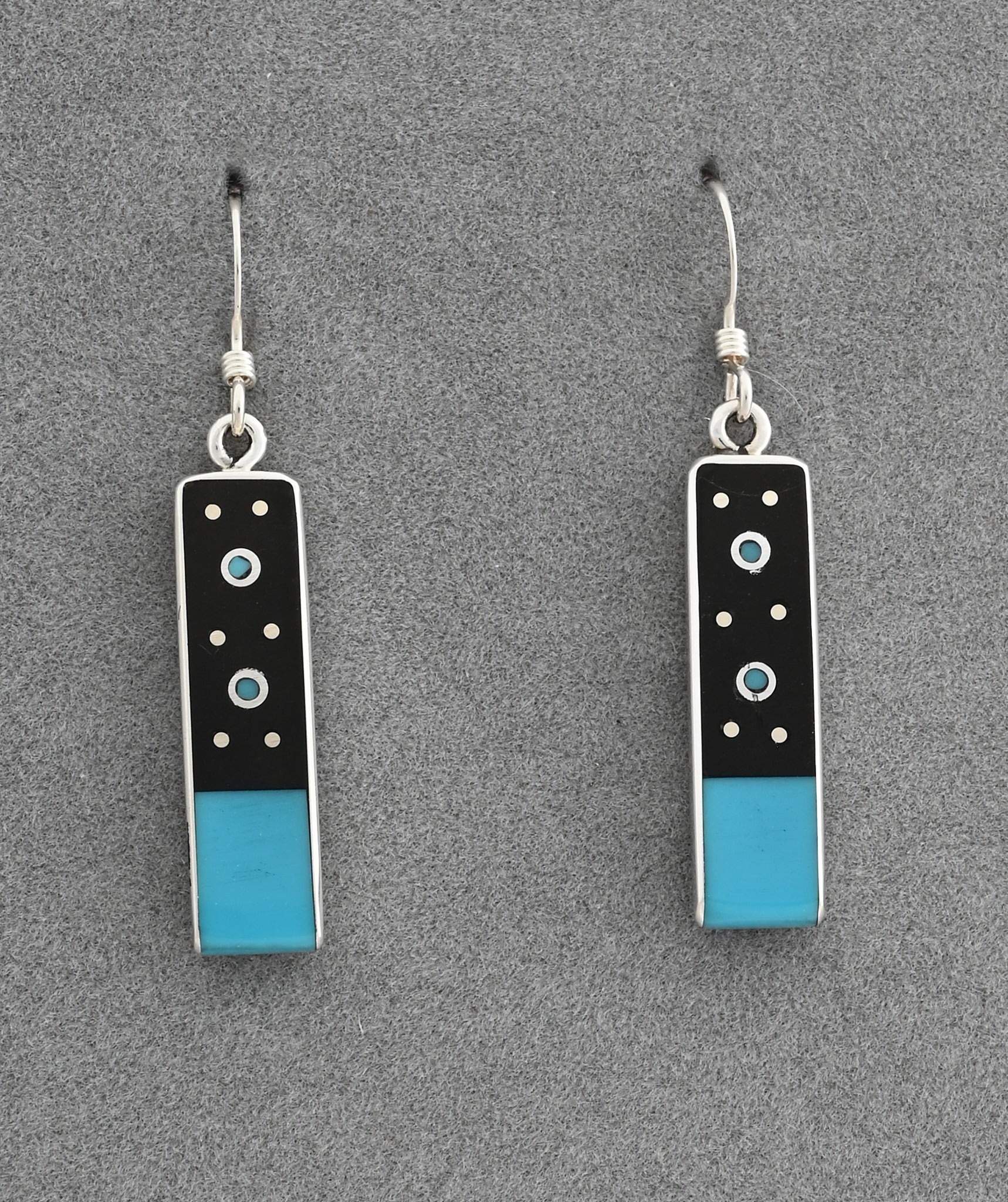Earrings by Jimmy Poyer
