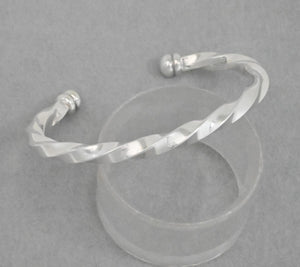 Bracelet with twisted wire cuff by Artie Yellowhorse