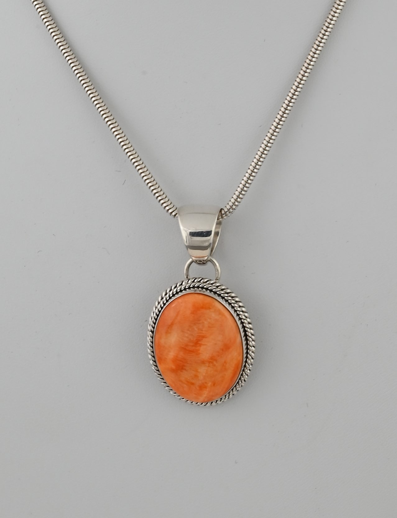 Pendant with Spiny Oyster by Artie Yellowhorse