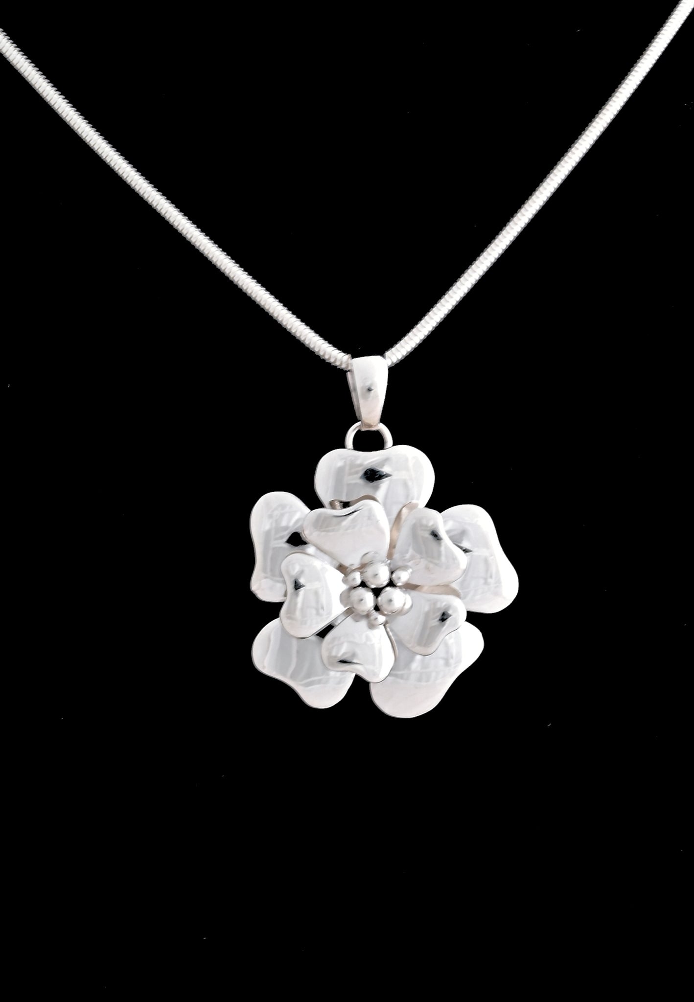 Pendant with Double Flowers by Artie Yellowhorse