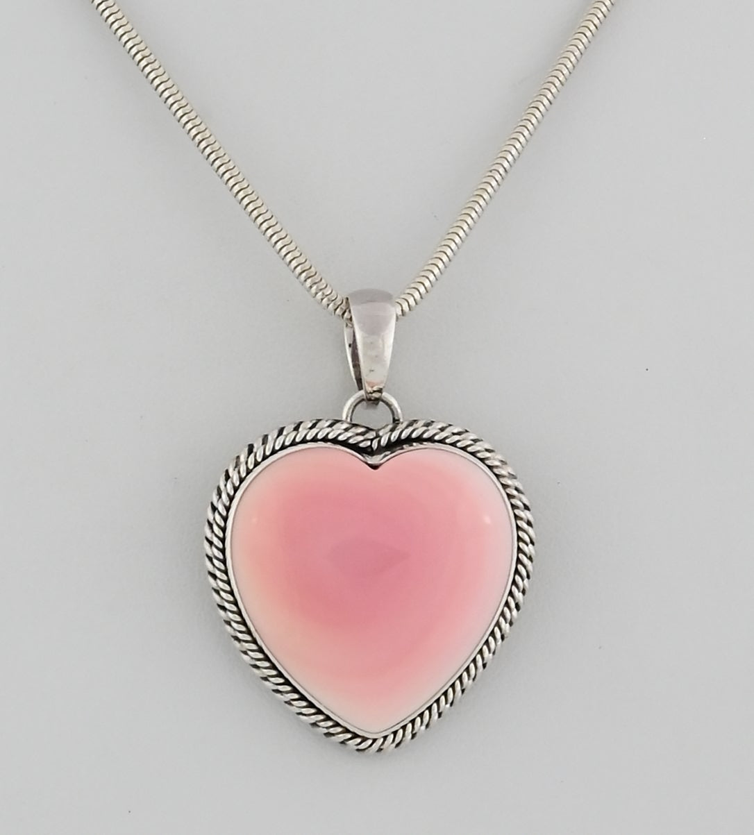 Pendant with Pink Conch Shell Heart by Artie Yellowhorse