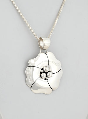 Pendant with Dogwood Design by Artie Yellowhorse