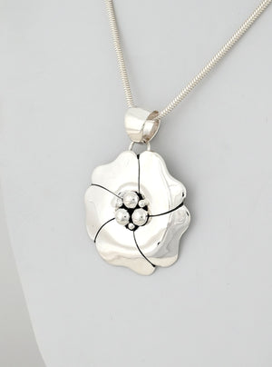 Pendant with Dogwood Design by Artie Yellowhorse