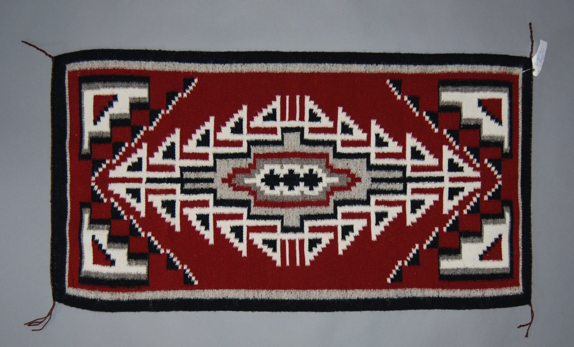 Navajo Weaving, Ganado Red by Lena Yozzie 24x47