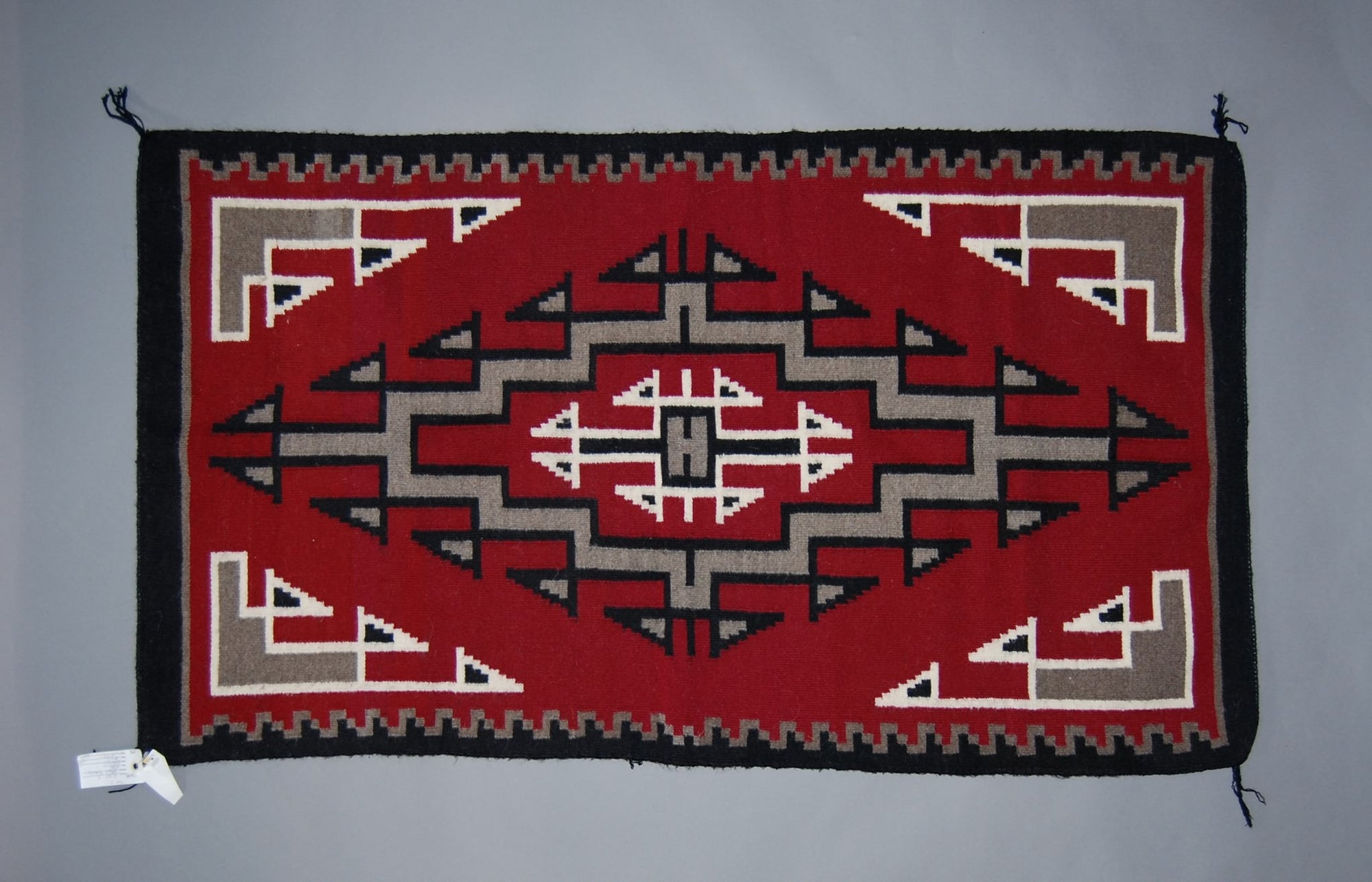 Navajo Weaving, Ganado by Stella Ashley 30x52